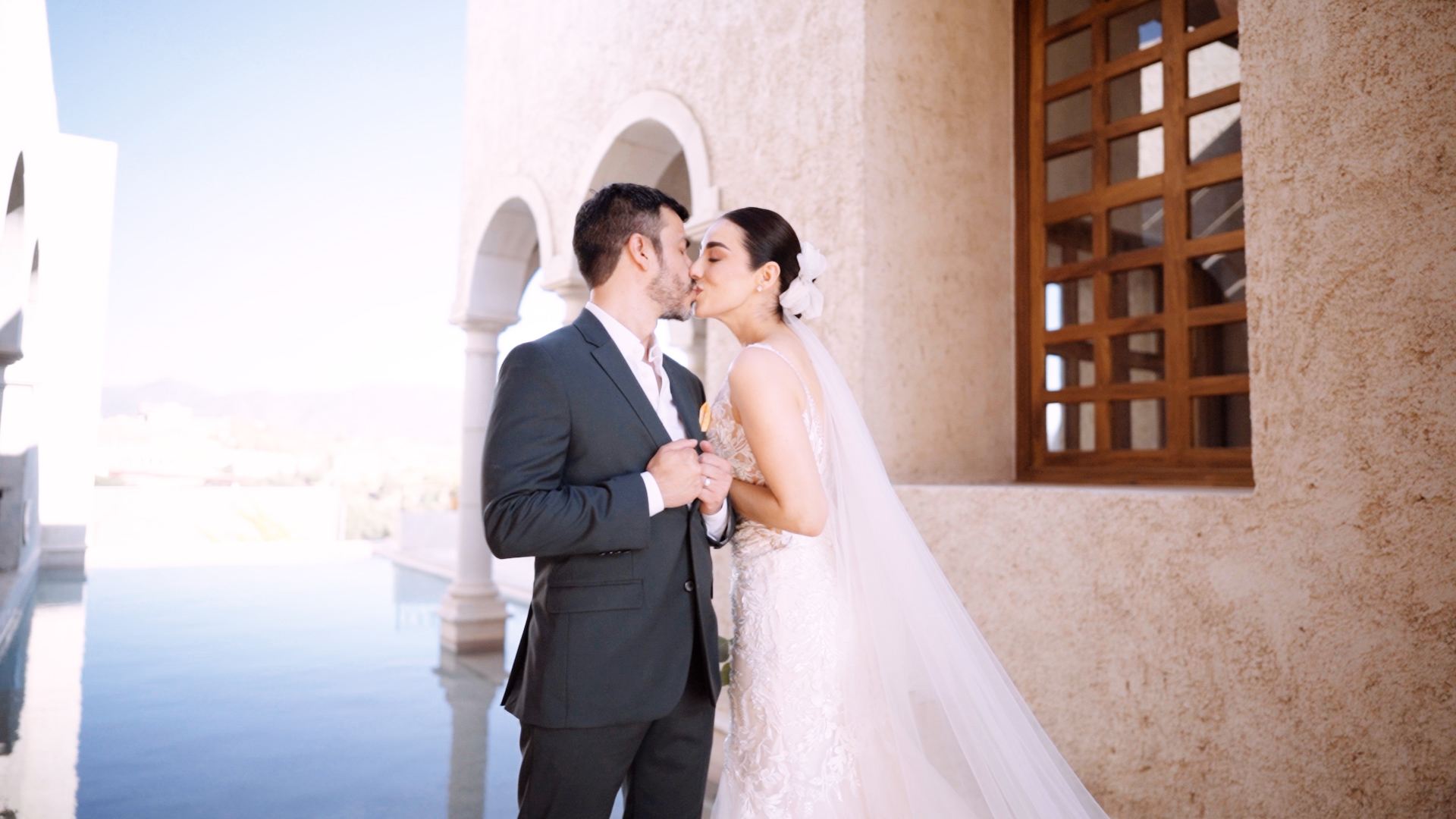 Couple kissing in a villa near valle de guadalupe